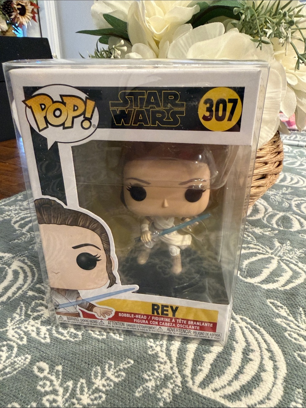 Funko Rey Pop! Figure in White with Blue Lightsaber